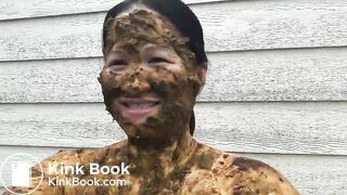 Asian woman smiles covered in scat