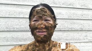 Asian woman smiles covered in scat