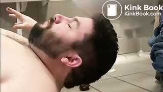 BEING FED IN A PUBLIC TOILET