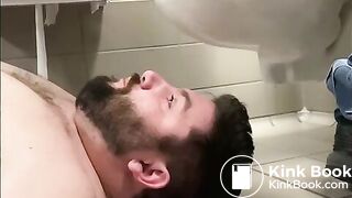 BEING FED IN A PUBLIC TOILET