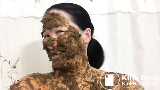 Asian woman laughs covered in scat
