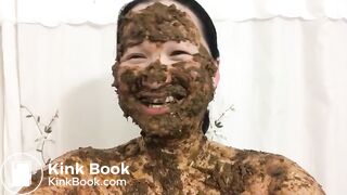 Asian woman laughs covered in scat