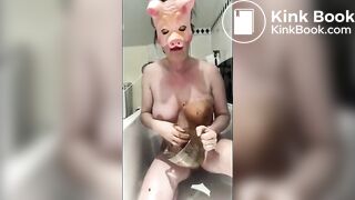 Pig masked swallow her own shit