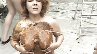 He Pisses on Her Scat Smeared Tits