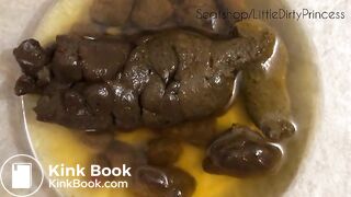 Big thick poop and bright yellow pee in a bowl