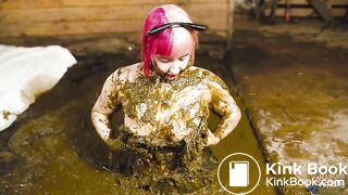 Catwoman Lyndra plays in cowshit