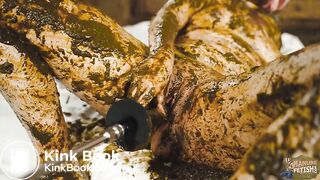 Catwoman Lyndra plays in cowshit