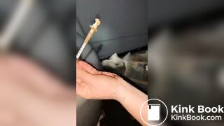 Syringe covered in shit for worthless human toilet