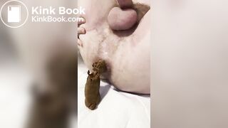 Pushing out a huge load in bed