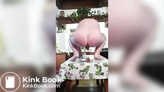 Pooping in the dish on kitchen table