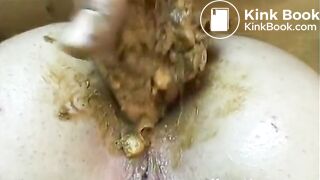 Putting shit back in ass