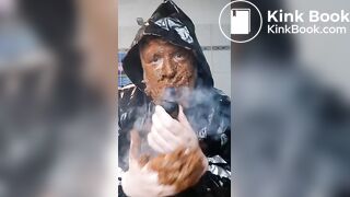 Smoking a pipe with a shit covered face