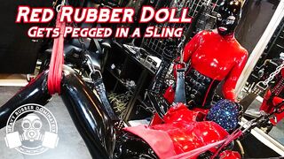 Red Rubber Doll Gets Pegged in Sling - Lady Bellatrix in latex catsuit with strapon