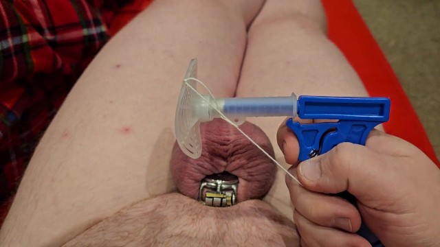 Fly Swatter Ballbusting in Chastity