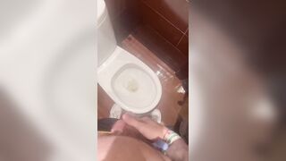 Two straight guys pee together at bar