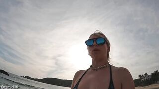 Busty girl masturbating, almost caught, embarrassed on beach