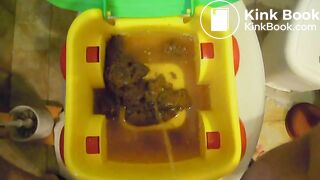 Piss into toy potty
