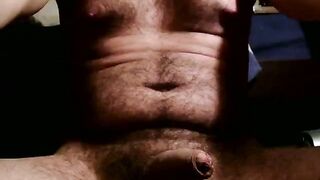 Beautiful masked guy covers his cock with warm feces