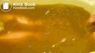 pooping in white brief in bathtub