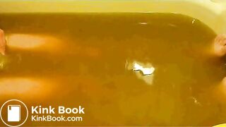 pooping in white brief in bathtub