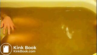 pooping in white brief in bathtub