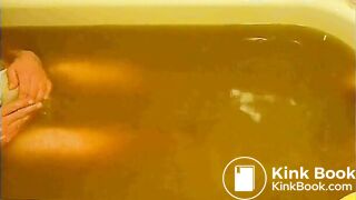 pooping in white brief in bathtub