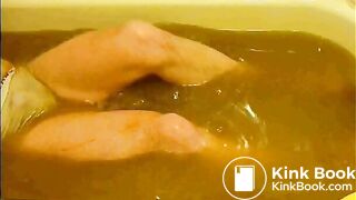 pooping in white brief in bathtub