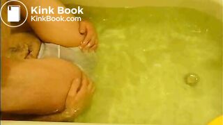 pooping in white brief in bathtub