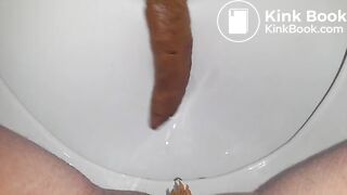 Dicke Wurst ins Klo gedrückt ;)