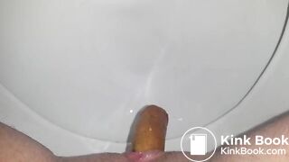 Dicke Wurst ins Klo gedrückt ;)