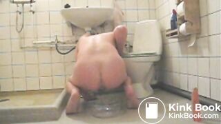 Boy shits in bowl and eats with dildo