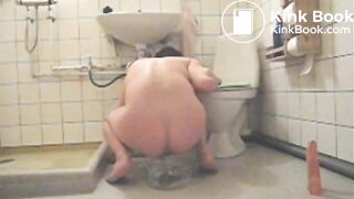 Boy shits in bowl and eats with dildo