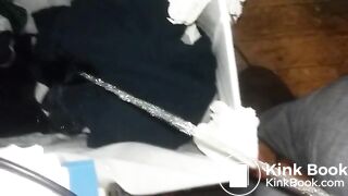Pissing on dirty clothes