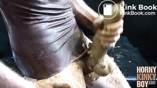 Scat Lover in Brown Rubber Eats and Plays Around