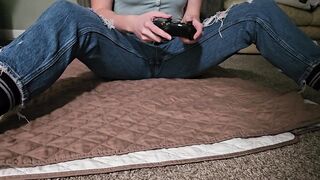 Girl pissing pants while gaming