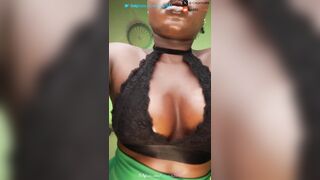 ebony slut shows her big pointy tits
