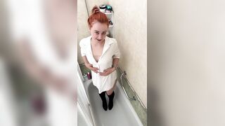 Taking Shower In T-shirt And High Heel Boots