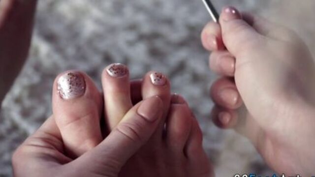 Footjob babe gets jizzed - video 1