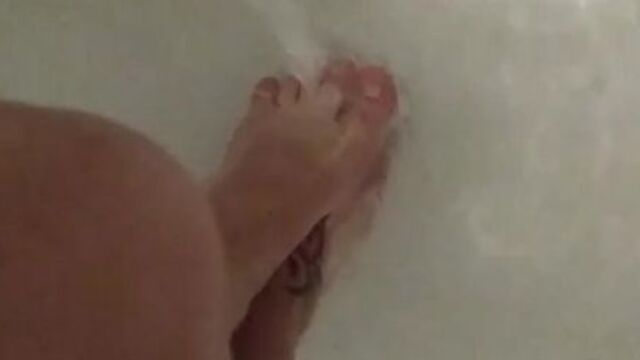 Feet Under Running Water