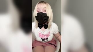 The cutie with the cat ears takes off her skirt.