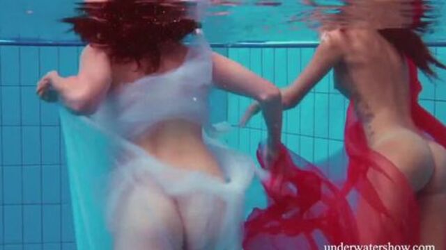 Two hotties naked in the pool