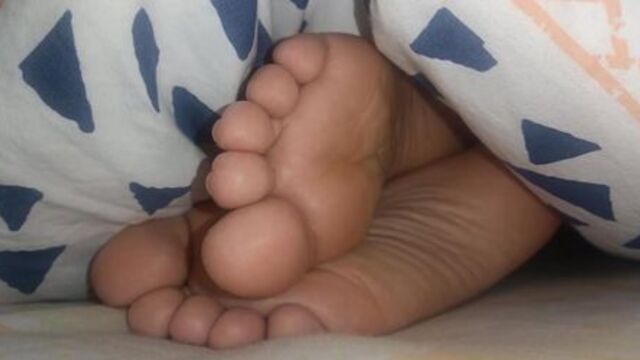 Staring at sleeping asian little feet