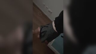 Pretty girl shows her legs in a skirt.