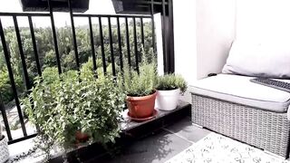 Pantyhose model is masturbating on balcony