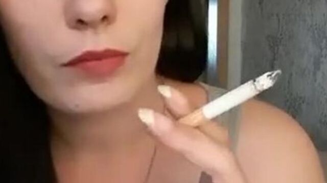 Amazing young brunette girl smoking sexy