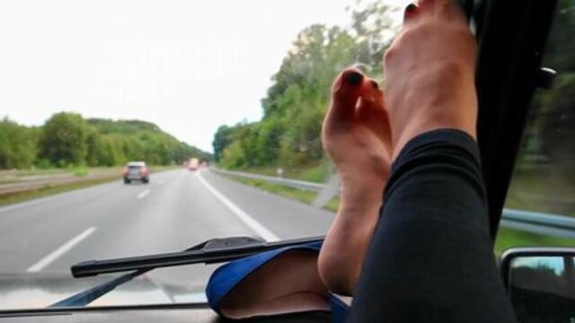 Sweaty Nylon Feet Playing On The Windshield