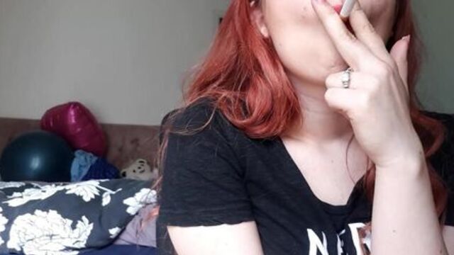 Teen redhead smoking