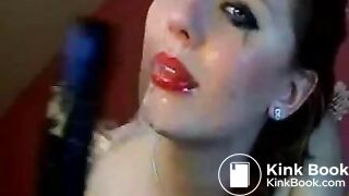 Hot chick makes herself gag on a big toy