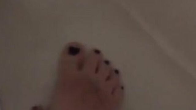 Playing with my feet in the bath tub