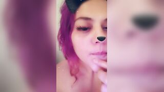 Licking lips clean, Snapchat fun.